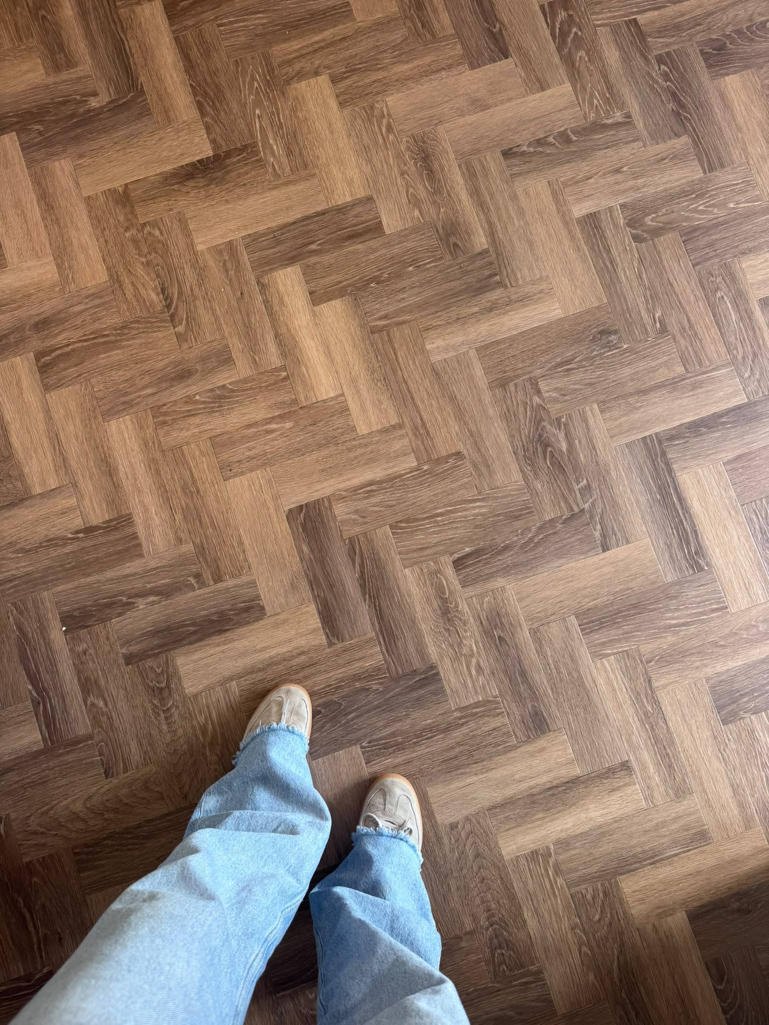 Close-up of Amtico Esker small parquet luxury vinyl flooring